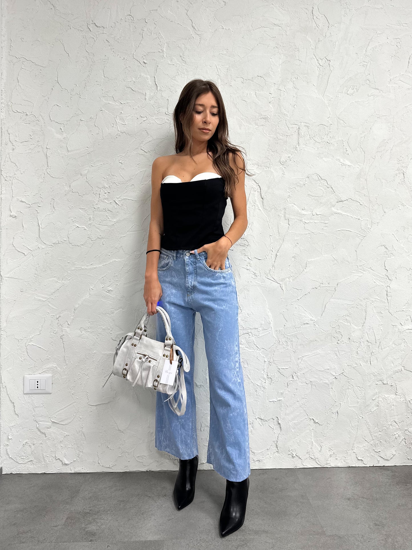 Jeans con cinturini